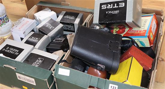 A collection of cameras and accessories